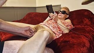 I watch porn and smoke a cigarette and he massages my stretched pussy