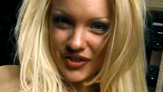 A blonde with the biggest boobs ever gives his small cock a deep blowjob