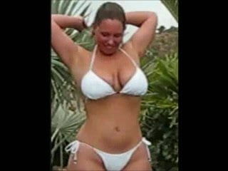 British PAWG strips out of bikini and oils up her curves