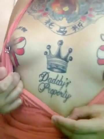 Filipina slut showing off her pierced and tattoo nipples