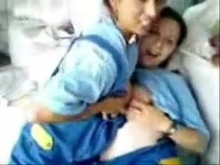 Girls licking each others nipples and rubbing tits together