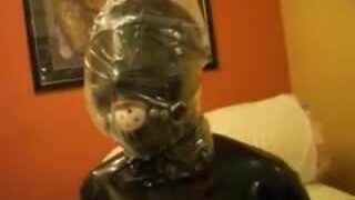 Latex bondage and plastic bag breathplay