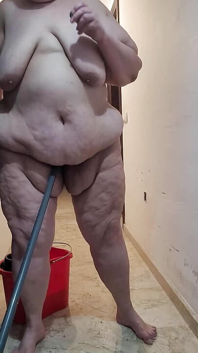Palmira Gordi.  Fat slut piss enjoys her old pussy