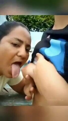 Amateur horny aunty sucking tits outdoors