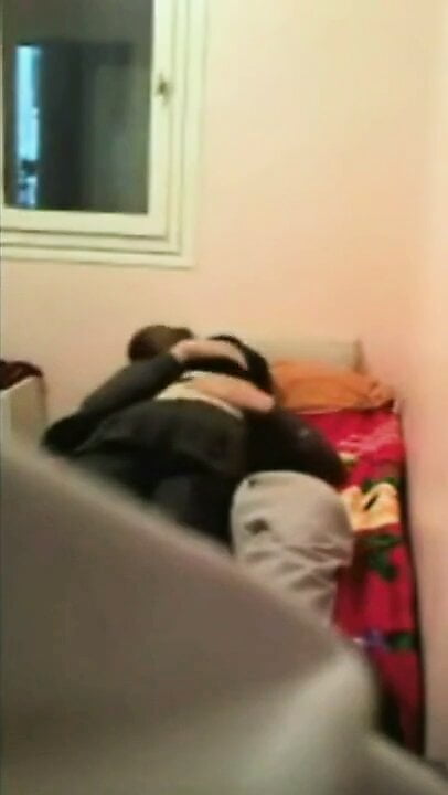 Arab couple in bed 4phone