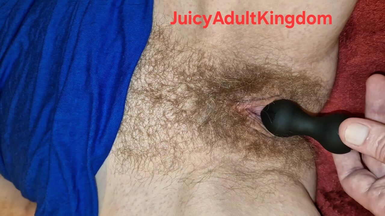 He inserts a vibrator into my pussy and massages my vagina