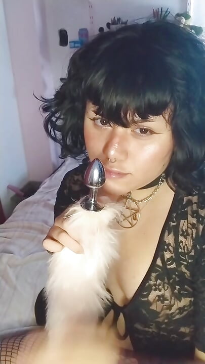 Petite slut playing with butt plug and shows her feet